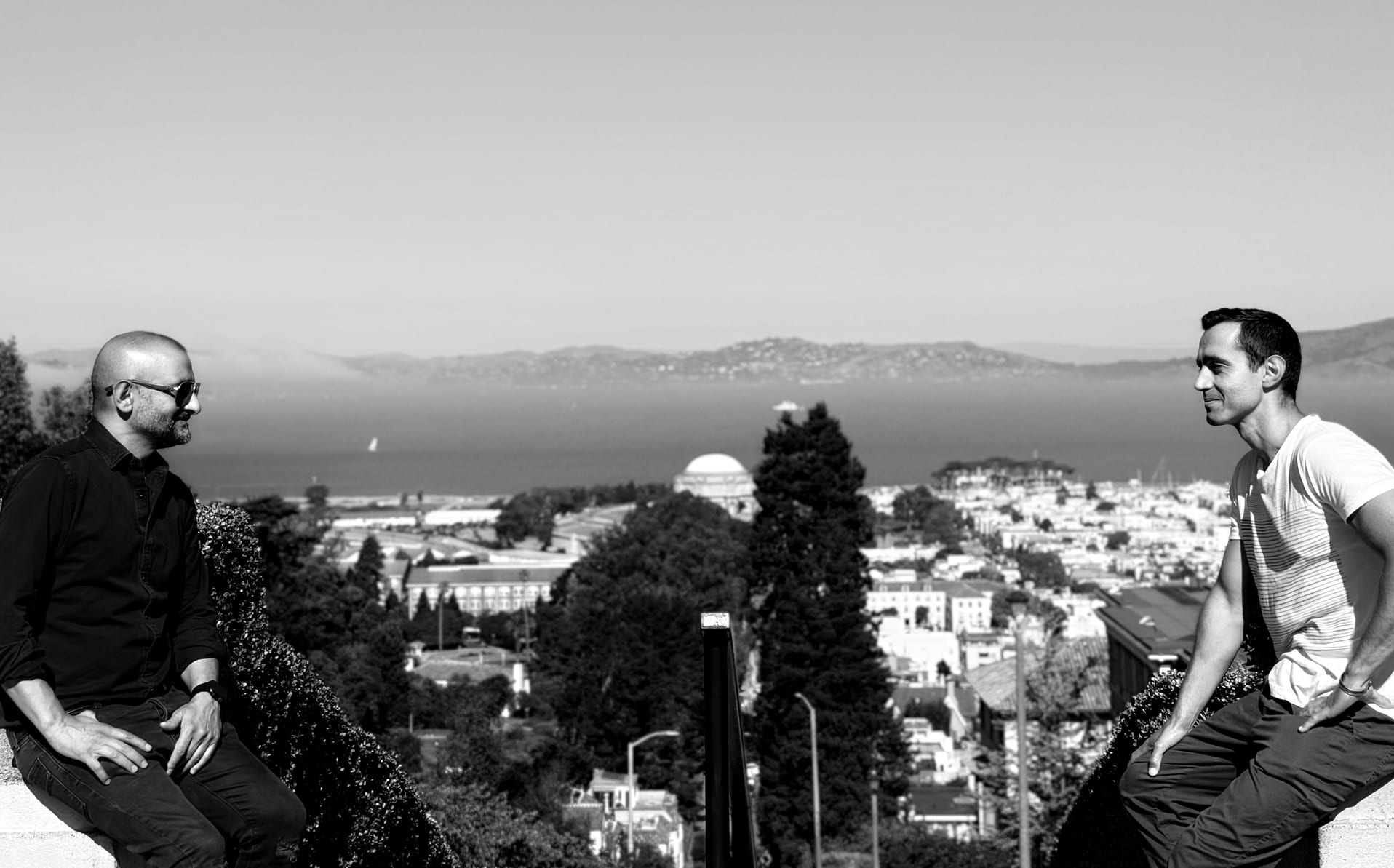 Hristo Vitchev and Jivko Petrov facing each other above the San Francisco Bay